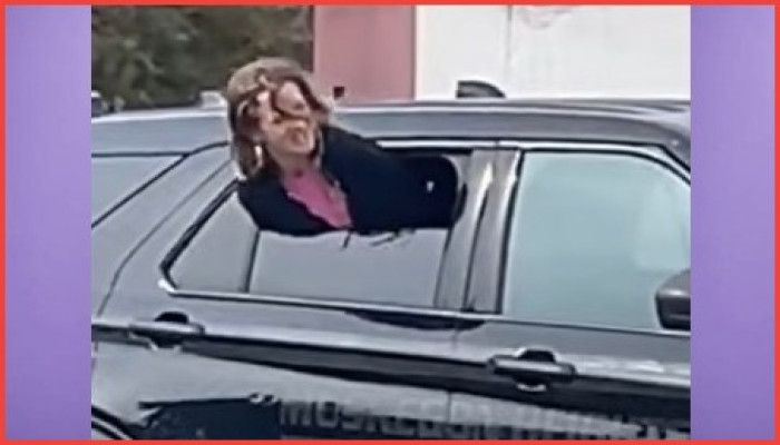 মিশিগানে পুলিশের গাড়ি থেকে হাতকড়া পরা নারীর দুঃসাহসিক পলায়ন